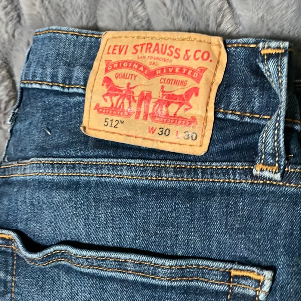 512 Levi’s. Never worn.  Tags were pulled off and tried on but too small.